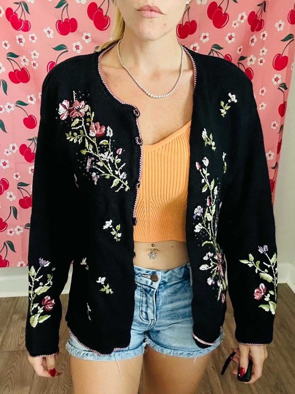 Tiara Black Knit Sweater with Pink Label Accent